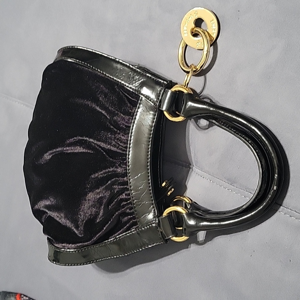 Vintage Bluegirl/Blumarine bag, black, with gold accents, pre owned. Hand bag.